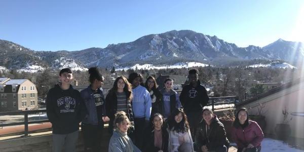 students with mountains